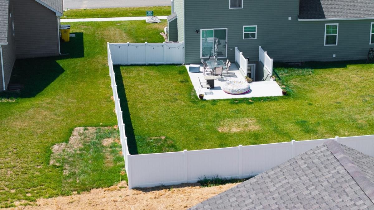 Vinyl privacy fence installation, aerial view